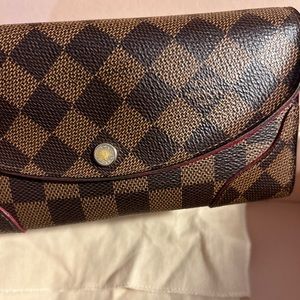 🧩Louis Vuitton Caissa Wallet, brown with cherry interior.